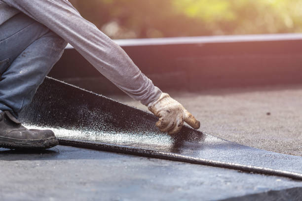 Professional Interior Drainage System technician working in Moriches, NY